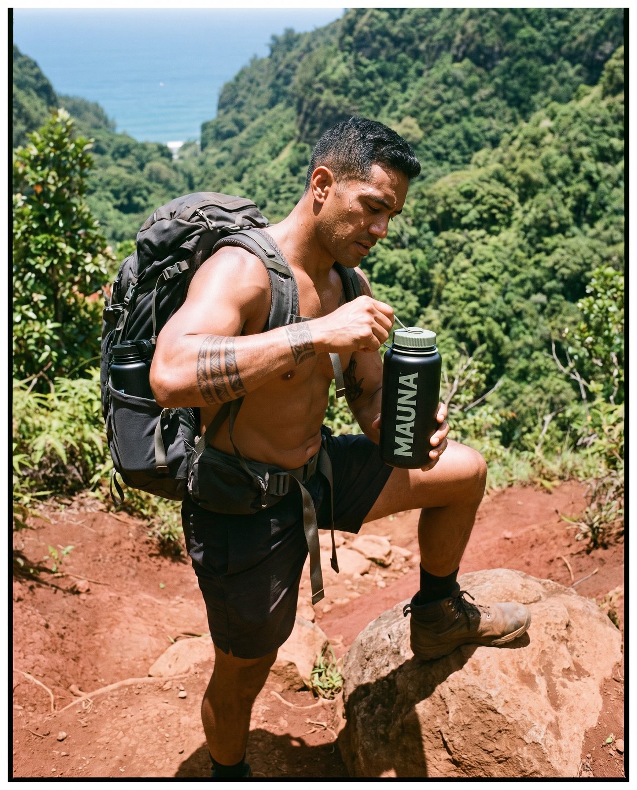 Backpacker on a red dirt switchback