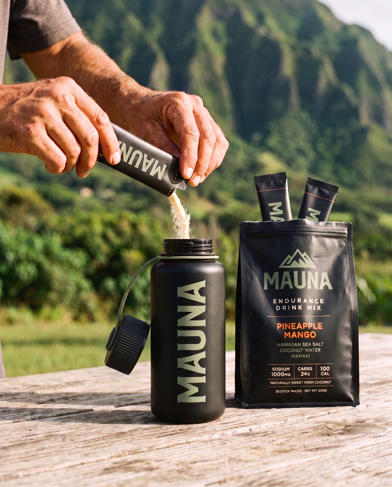 Pouring a MAUNA stick into a 32oz wide-mouth bottle